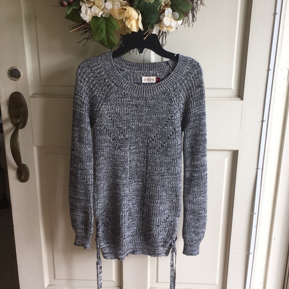 Gray sweater, ties at bottom